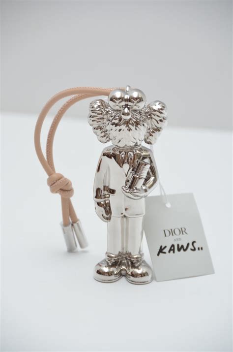 kaws dior perfume bottle|KAWS Dior clothing for women.